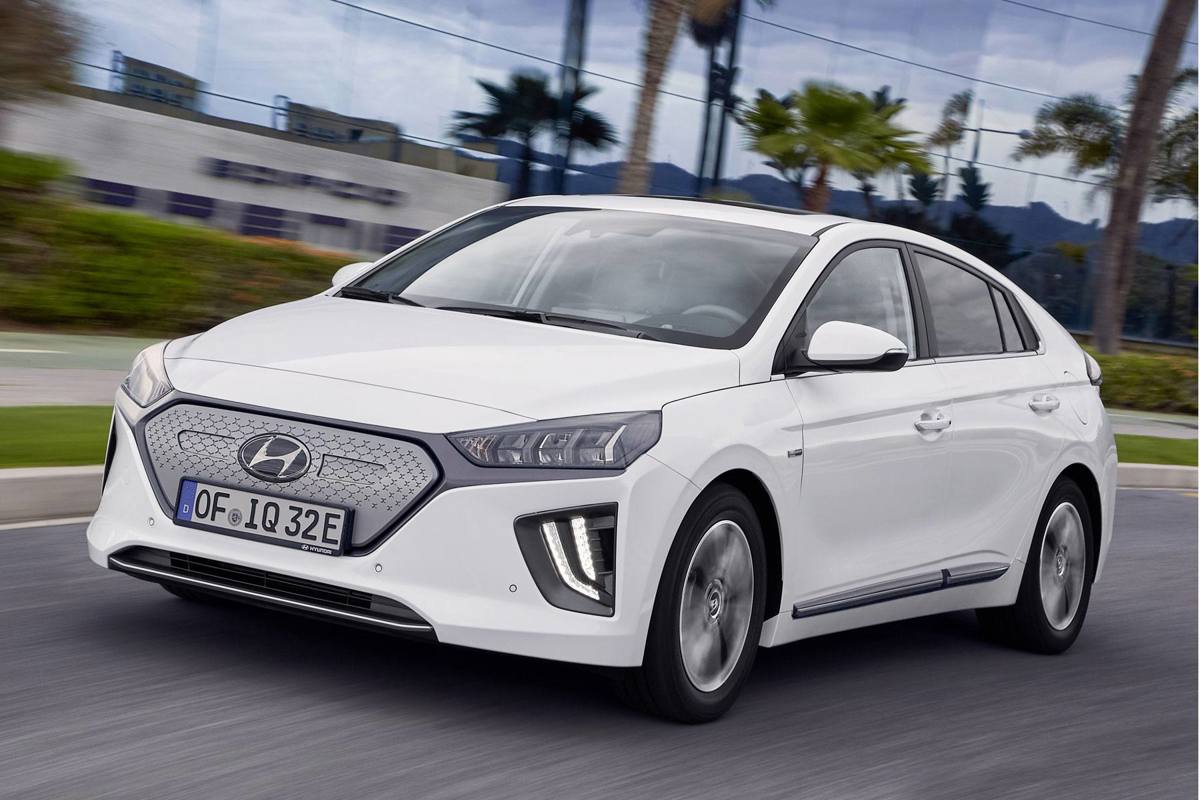 White Hyundai's IONIQ Electric driving in city