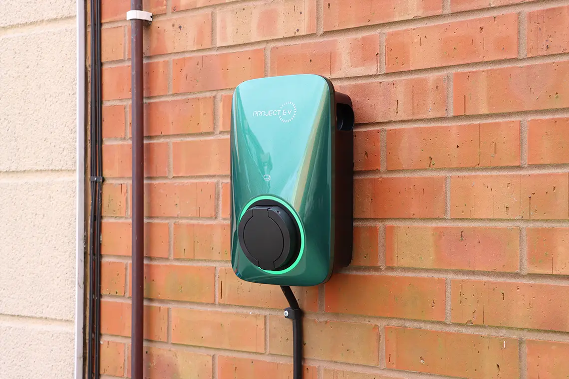 Project EV APEX side image on wall in green