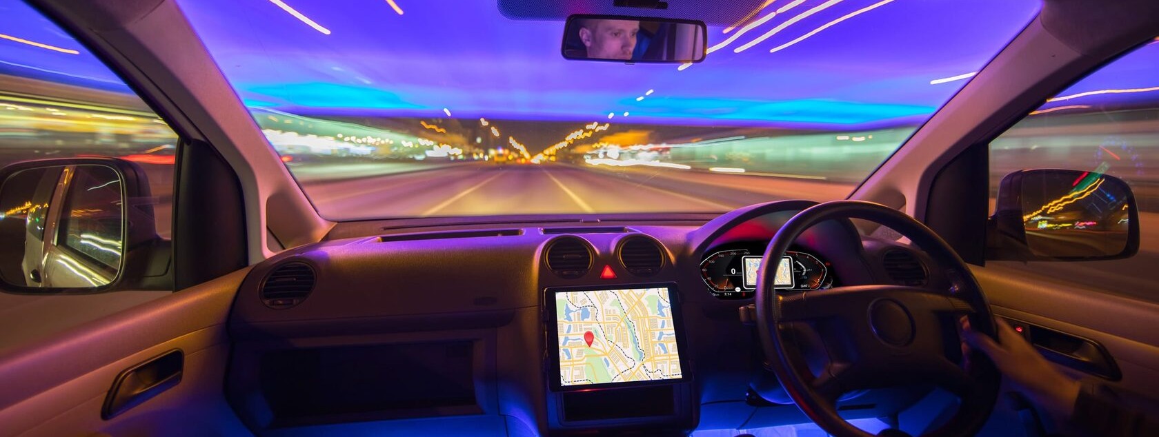 car driving at night inside view